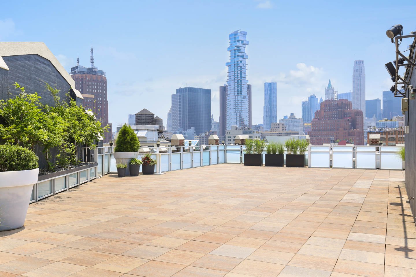 photo: rooftop ceremony space with downtown manhattan views